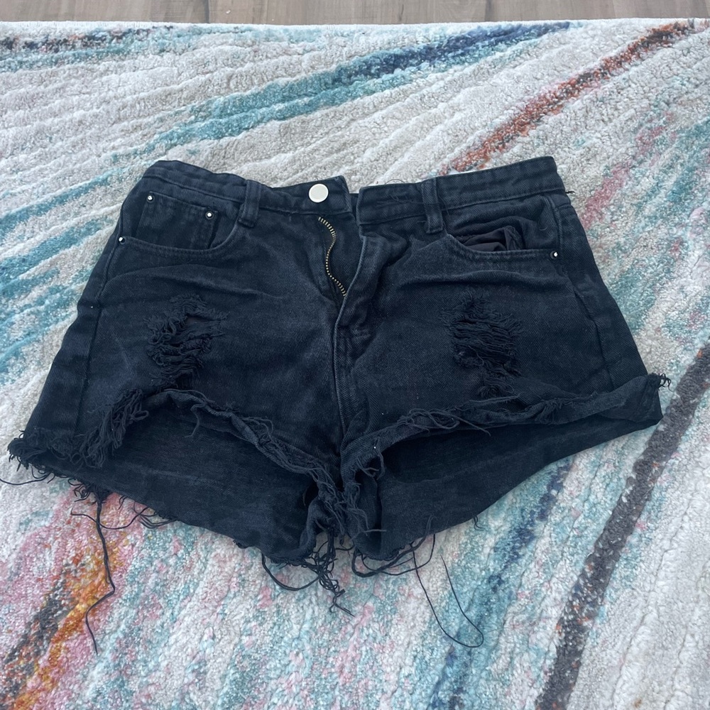 Black distressed jean shorts